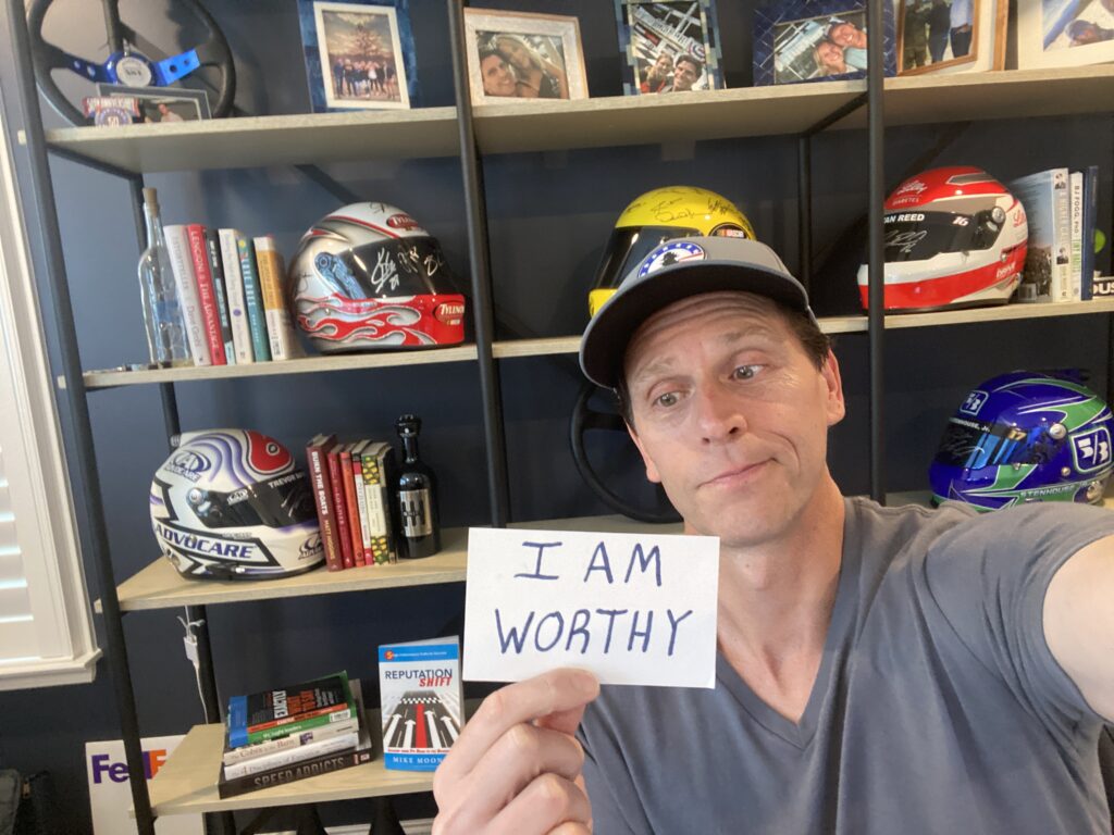 An index card with the handwritten quote 'You are enough' as a visual reminder of self-worth