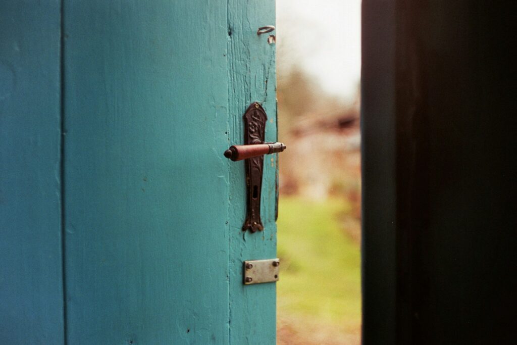 Visual representation of the door of expectations and belief, illustrating the journey to success through mindset shift.